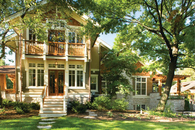 This is an example of a transitional split-level brown exterior in Chicago.