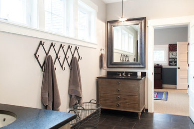 Bathroom - contemporary gray tile and ceramic tile bathroom idea in Portland with an undermount sink, furniture-like cabinets, distressed cabinets and granite countertops