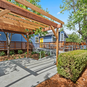 Accessible Backyard Patio with Timber Pergola and Concrete Ramp | Novato