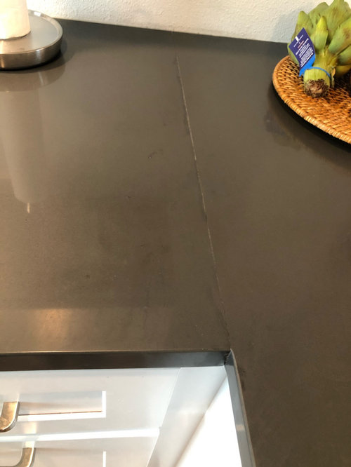 Quartz Countertop Holes drilled and seam.