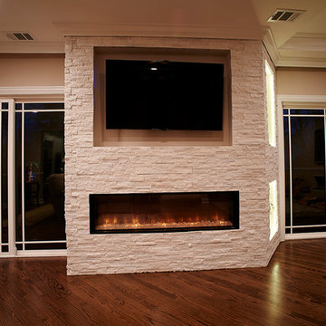 Modern Living Room Fireplace with Stone Surround and Built-In TV Niche