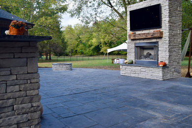 Patio kitchen - large modern backyard concrete patio kitchen idea in Nashville with no cover