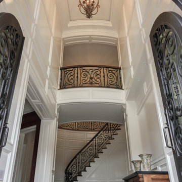 Project #74 | Circular Staircase with Hand-Forged Metal Panels