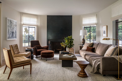 Mid-sized transitional formal and enclosed light wood floor and beige floor living room photo in Seattle with beige walls, a standard fireplace, a metal fireplace and no tv