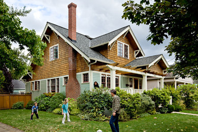 Inspiration for a timeless wood exterior home remodel in Portland
