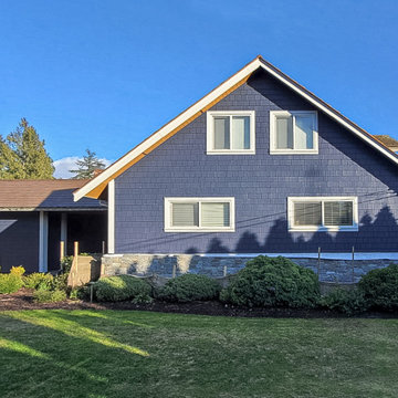 JH Shingles Cedarmill in DEEP OCEAN + 1X6 Pine soffit. WOODTONE. Honey brown
