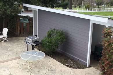 Example of an exterior home design in Other