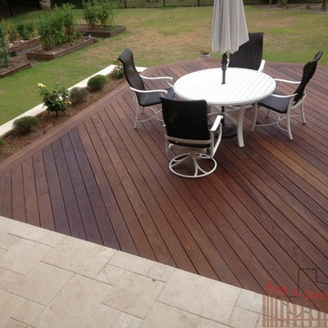 Ipe Hardwood Decking with Metal Framing, Limestone Flower Beds around Deck