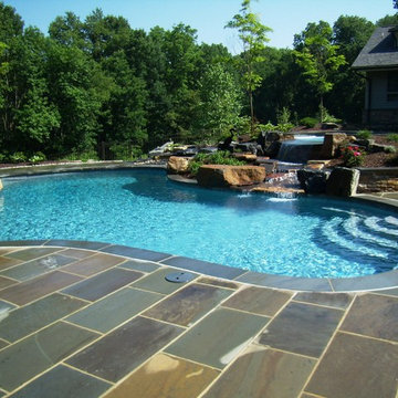 Delaware Township custom pool and raised spa with negative edge & water feature