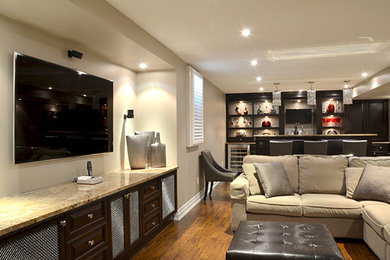 Example of a large transitional look-out basement design in Toronto with gray walls