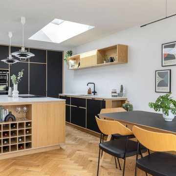 Sleek, modernised retro 70's open plan kitchen diner