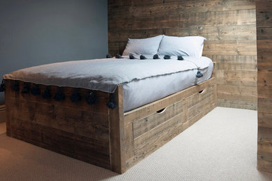 This is an example of a medium sized rustic bedroom in Other.