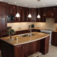 12x24 light tile with cherry cabinets