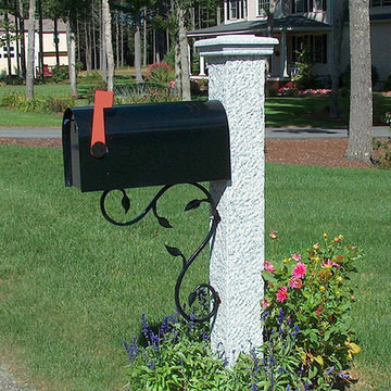 Granite Mailbox Post with Flowers around Base