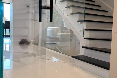 Inspiration for a transitional staircase remodel in Montreal