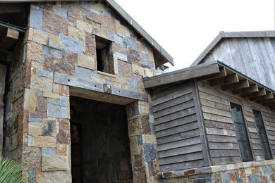Inspiration for a rustic exterior home remodel in Dallas