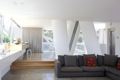 Photo of a mid-sized contemporary home design in Sydney.