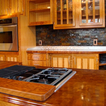 Figured cherry kitchen cabinets