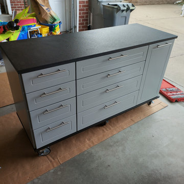 Dove gray workbench with matching cabinets
