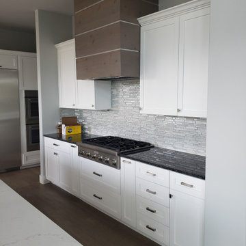 White shaker with auto open trash bin