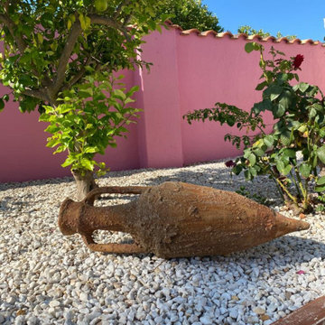 Ámfora en jardín