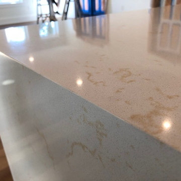 White & Tan Waterfall on Quartz Countertop