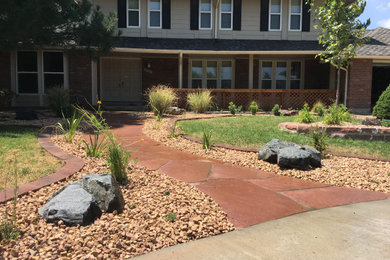 This is an example of a large craftsman front yard stone walkway in Denver.