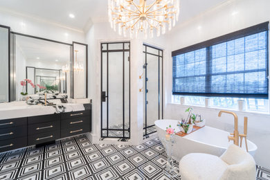 Inspiration for a mid-sized transitional master porcelain tile, black floor and single-sink bathroom remodel in Tampa with flat-panel cabinets, black cabinets, white walls, an undermount sink, a hinged shower door, black countertops and a floating vanity