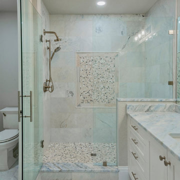 Refined Coastal Bathroom with Polished Marble Finishes