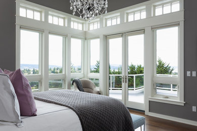 Bedroom - mid-sized transitional master medium tone wood floor and brown floor bedroom idea in Seattle with gray walls and no fireplace