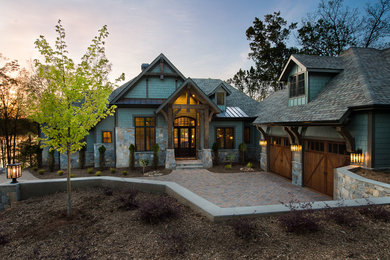 Photo of a mid-sized modern full sun front yard brick landscaping in Other.