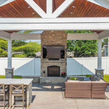 Open Gable Pool House with Fireplace and Grilling Area
