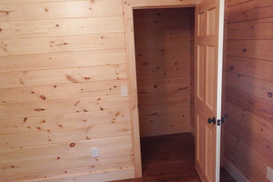 Inspiration for a rustic closet remodel in Boston