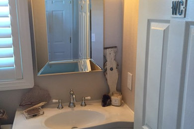 Inspiration for a mid-sized coastal 3/4 bathroom remodel in San Francisco with a two-piece toilet and a pedestal sink
