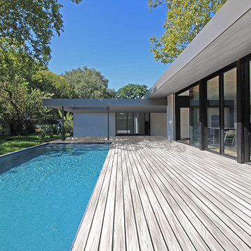 Villa d'exception à patios et parement en pierres noires