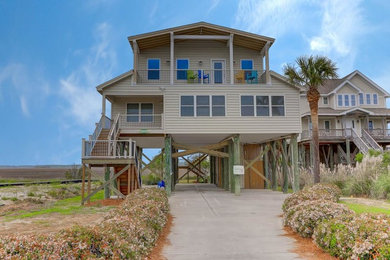 Huge arts and crafts gray exterior home photo in Charleston