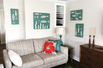 Inspiration for a mid-sized coastal open concept dark wood floor living room remodel in Bridgeport with beige walls and a wall-mounted tv