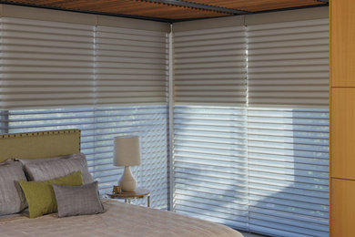 Example of a large trendy home design design in Calgary