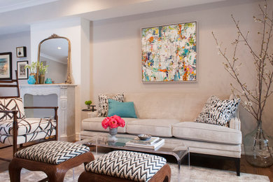 Mid-sized transitional open concept medium tone wood floor living room photo in Philadelphia with gray walls, a standard fireplace and a stone fireplace