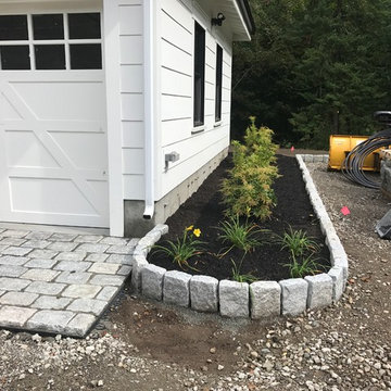 LYNNFIELD BRICK WALKWAY PATH WITH MONOLITHIC GRANITE STEPS TO PORCH