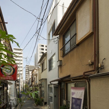 「佃の家」8.6坪の土地に二世帯住宅