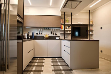 Design ideas for a large modern u-shaped eat-in kitchen in Other with with island.