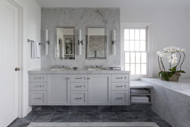 Example of a mid-sized transitional master gray tile, white tile and stone slab porcelain tile bathroom design in San Francisco with shaker cabinets, gray cabinets, a two-piece toilet, white walls, an undermount sink and marble countertops
