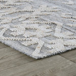 Kosas Home - Hoeft Indoor Outdoor Handwoven Gray Multi Area Rug, 9x12 - Introduce artisanal beauty and texture into any indoor or outdoor setting with this rug handwoven with a timeless, geometric pattern. Cool gray hues make this versatile rug that suits any color scheme with ease. Woven from polyester yarn created by recycled plastic bottles, this rug offers long lasting, sustainable beauty while its textured pattern adds tempting softness.