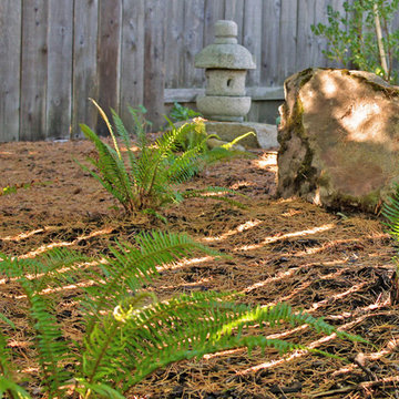 Woodland Garden with Stone Sculpture