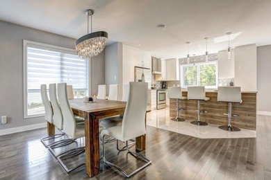 Example of a transitional kitchen design in Montreal