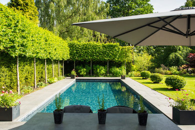 Design ideas for a contemporary pool in Cheshire.