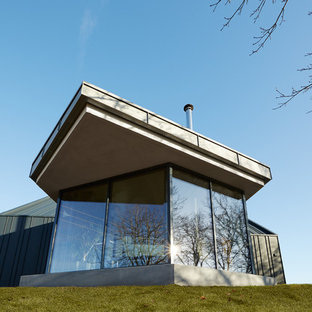 Moderner Wintergarten mit Kaminofen Ideen, Design & Bilder - August