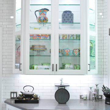 Custom cabinets with glass doors and shelves