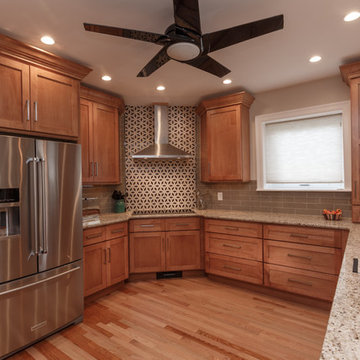 Warm Wood Transitional Kitchen Remodel | Granite Countertops & Tile Accent Wall